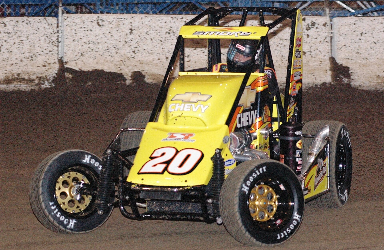 Midget race car on the indoor dirt track at the Chili Bowl Nationals in Tulsa